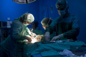 Doctors Operating Essure coil removal surgery