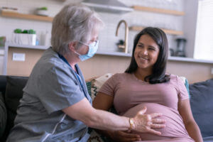 Midwife Visiting Ethnic Pregnant Woman